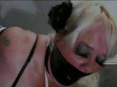 KiloGirls presents: Extreme mouth gag and hogtied tight.