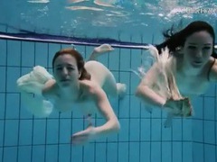 KiloGirls presents: Nearly naked girls go swimming in the pool
