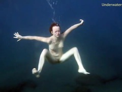 KiloGirls presents: Redheaded girl is so sexy naked in the water