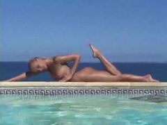 KiloGirls presents: Blonde strips from bikini and takes a dip