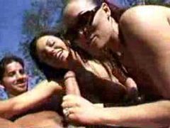 KiloGirls presents: Playful girls double team his dick with their mouths