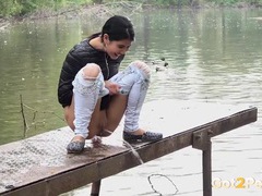KiloGirls presents: Public pissing girl in jeans goes in two places