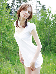 KiloGirls presents: Timid teen girl comes to the nature and poses her beautiful body in front of the camera.