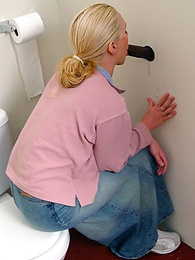 KiloGirls presents: Blonde girl Jamie sits on the toilet and blows a black gloryhole dong