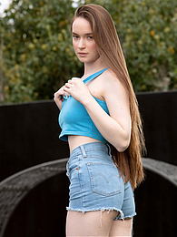 KiloGirls presents: Beautiful Brunette Teen Hazel Shows Off Her Hairy Pussy and Masturbates Outdoors.