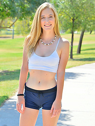 KiloGirls presents: Sporty blonde babe Dakota strips her clothes and flaunts her hot body outdoors