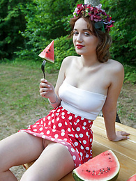 KiloGirls presents: Nice belarusian stunner Rokki removes all clothes on a blanket in a backyard