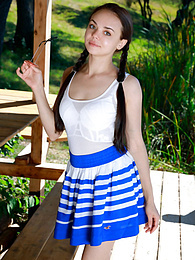 KiloGirls presents: Fresh-Faced russian beauty Mia Grandy gets totally naked on a picnic table in a garden